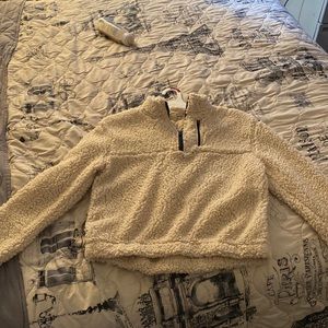 Size medium fluffy jacket fits like a small